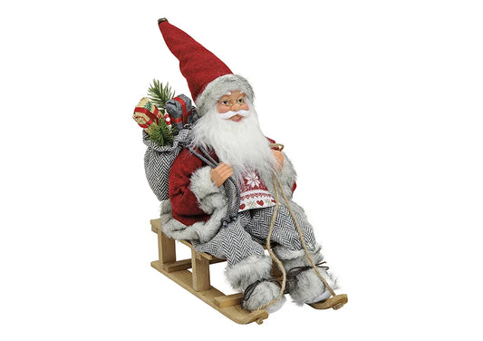 Nikolaus auf Schlitten in rot - Avaloon Party-Deko-Geschenke