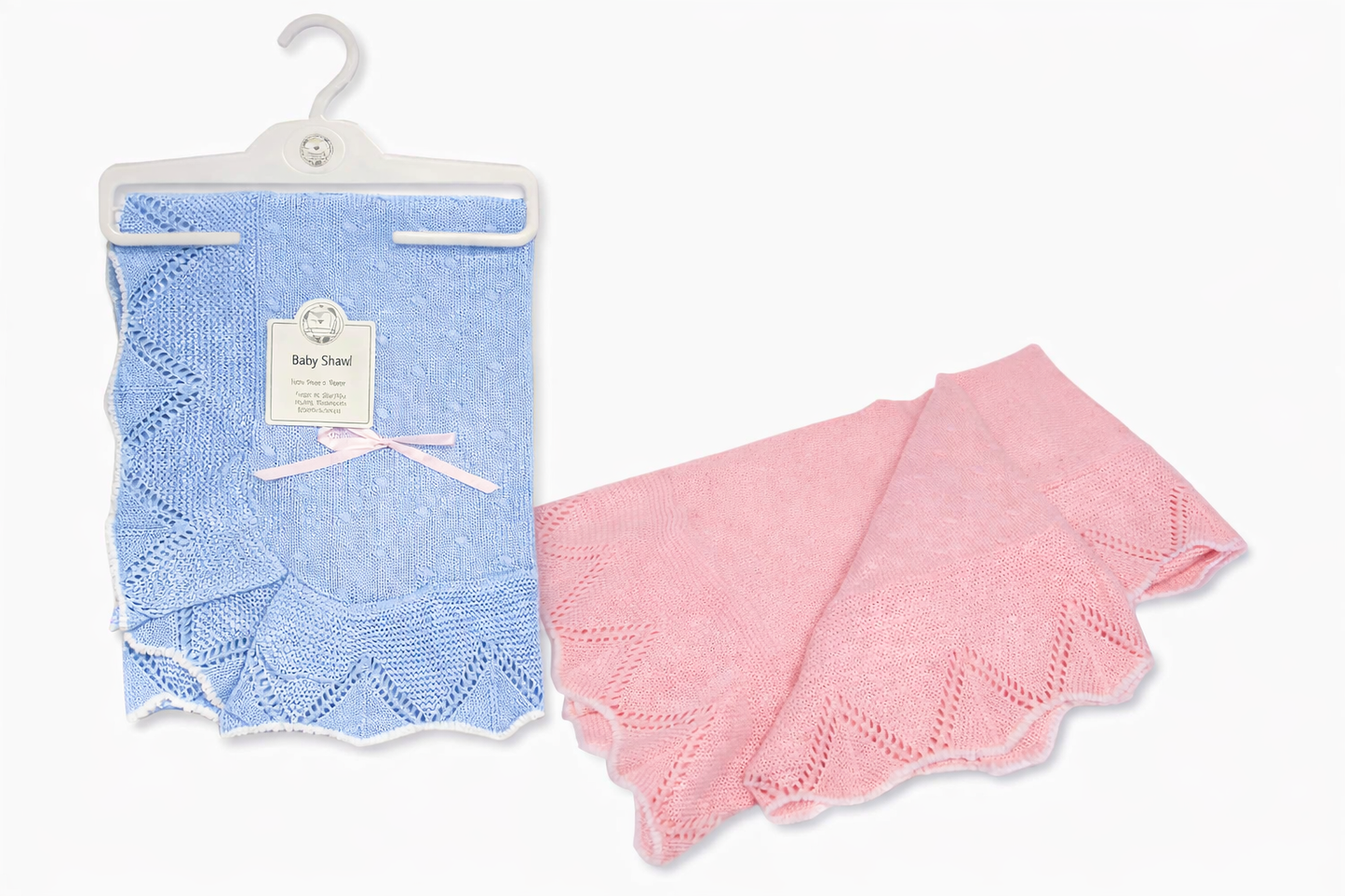 Baby knitted blanket with zigzag edge, pattern, and bow